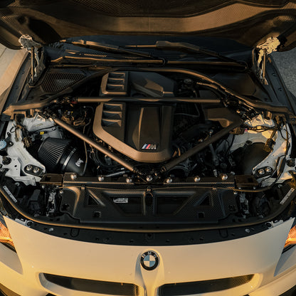RVNG MonoFlow intake installed in a white BMW G8X S58 engine bay