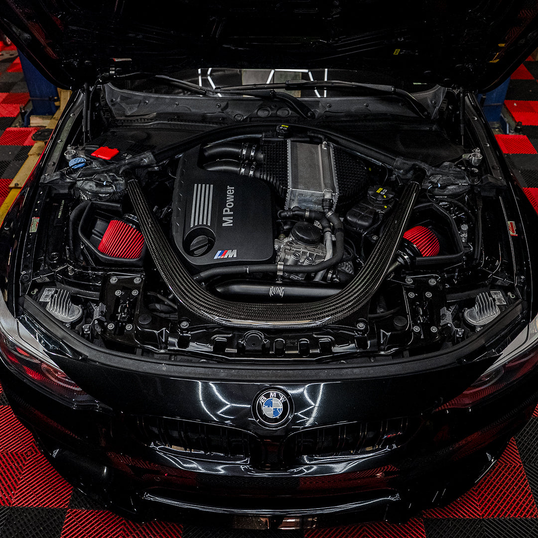 RVNG heat-shielded dual intake installed in a BMW F8X S55 engine bay
