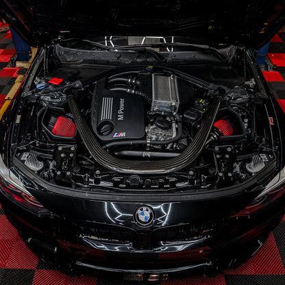 RVNG heat-shielded dual intake installed in a BMW F8X S55 engine bay